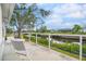 Relaxing patio overlooking the canal with outdoor seating at 2322 Riverbluff Pkwy # V250, Sarasota, FL 34231