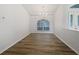 Bright dining room features wood-look floors and a chandelier at 13 Perimeter Dr, Englewood, FL 34223