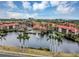 Community overview with lake, pool and tennis courts at 2400 Feather Sound Dr # 613, Clearwater, FL 33762