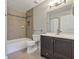 Updated bathroom with double vanity and tile shower/tub at 2400 Feather Sound Dr # 613, Clearwater, FL 33762