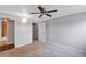 Spacious bedroom with ceiling fan and access to bathroom and closet at 2400 Feather Sound Dr # 613, Clearwater, FL 33762