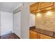 Entryway with double closets and wood-look flooring at 2400 Feather Sound Dr # 613, Clearwater, FL 33762
