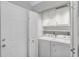 Shared laundry room with washer and dryer at 2400 Feather Sound Dr # 613, Clearwater, FL 33762
