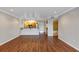 Spacious living room with hardwood floors and kitchen views at 2400 Feather Sound Dr # 613, Clearwater, FL 33762