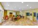 Community clubhouse with comfortable seating and a workspace at 2400 Feather Sound Dr # 613, Clearwater, FL 33762