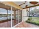 Enjoy the view from this screened patio with sliding glass doors at 2400 Feather Sound Dr # 613, Clearwater, FL 33762