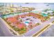 Aerial view of waterfront community with pool and boat slips at 2600 N Paula Dr # 19A, Dunedin, FL 34698