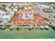 Aerial view of waterfront property with boat slips and pool at 2600 N Paula Dr # 19A, Dunedin, FL 34698