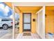 Exterior entrance with a welcoming doormat at 2600 N Paula Dr # 19A, Dunedin, FL 34698
