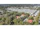 Wide aerial view of apartment buildings and surrounding mobile homes at 11511 113Th St # 13F, Seminole, FL 33778