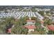 Wide aerial view of apartment buildings and surrounding mobile homes at 11511 113Th St # 13F, Seminole, FL 33778