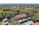 Aerial view of apartment building showcasing its red roof and covered parking at 11511 113Th St # 13F, Seminole, FL 33778