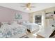 Guest bedroom with two twin beds and light walls at 11511 113Th St # 13F, Seminole, FL 33778