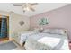 Spacious bedroom with two twin beds, and an adjacent bathroom at 11511 113Th St # 13F, Seminole, FL 33778