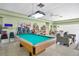 Enjoy the community room featuring a pool table and ample seating at 11511 113Th St # 13F, Seminole, FL 33778