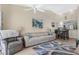 Relaxing living room with comfortable seating and a view into the kitchen at 11511 113Th St # 13F, Seminole, FL 33778