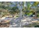 Overlooking a shaded parking lot with covered carport spaces at 11511 113Th St # 13F, Seminole, FL 33778