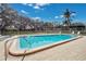Relax by the inviting community pool, complete with lounge chairs at 11511 113Th St # 13F, Seminole, FL 33778