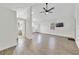 Bright living room with vinyl flooring and ceiling fan at 2011 Dartmouth N Ave, St Petersburg, FL 33713