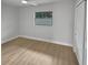Light and airy bedroom with wood-look floors at 2801 65Th N Way, St Petersburg, FL 33710