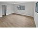 Spacious bedroom with light walls, wood-look floors, and ample closet space at 2801 65Th N Way, St Petersburg, FL 33710
