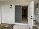 Exterior door leading to a room with light wood floors at 2801 65Th N Way, St Petersburg, FL 33710