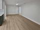Open living area with light walls and wood-look floors at 2801 65Th N Way, St Petersburg, FL 33710