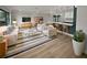 Bright living room featuring hardwood floors, comfy seating, and a stylish coffee table at 2801 65Th N Way, St Petersburg, FL 33710