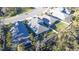 Aerial view of neighborhood homes with lush landscaping at 3514 Shimmering Oaks Dr, Parrish, FL 34219