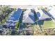 Aerial view showcasing a home's backyard and neighborhood at 3514 Shimmering Oaks Dr, Parrish, FL 34219