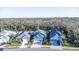 Aerial view of a neighborhood with tree-lined streets at 3514 Shimmering Oaks Dr, Parrish, FL 34219