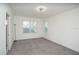 Spacious bedroom with gray carpeting and ceiling fan at 3514 Shimmering Oaks Dr, Parrish, FL 34219