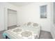 Bedroom with patterned bedspread and spacious closet at 3514 Shimmering Oaks Dr, Parrish, FL 34219