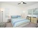 Spacious bedroom with a king-size bed and plenty of natural light at 3514 Shimmering Oaks Dr, Parrish, FL 34219