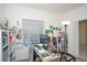 Home office with desk, computer, and ample storage at 3514 Shimmering Oaks Dr, Parrish, FL 34219