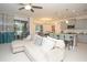 Open concept kitchen and living area, featuring modern appliances and a spacious layout at 3514 Shimmering Oaks Dr, Parrish, FL 34219