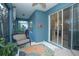 Relaxing screened porch with seating and ceiling fan at 3514 Shimmering Oaks Dr, Parrish, FL 34219