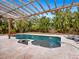 Inviting pool area with pergola, fire pit, and ample patio space at 431 Island Cir, Sarasota, FL 34242