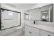 Modern bathroom with white subway tile and updated vanity at 4406 Woodtrail Blvd, New Port Richey, FL 34653
