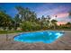 Stunning illuminated pool, perfect for evening swims at 446 Country Club Rd, Belleair, FL 33756