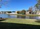 Backyard with a pond view and green grass at 25737 Frith St, Land O Lakes, FL 34639