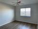 Spacious bedroom with wood-look floors and window blinds at 25737 Frith St, Land O Lakes, FL 34639