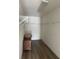 Large walk-in closet with wire shelving and wood flooring at 25737 Frith St, Land O Lakes, FL 34639