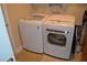 Bright laundry room with LG washer and dryer at 32026 Wenlock Loop, Wesley Chapel, FL 33543