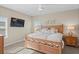 Large bedroom with a king-size bed and plenty of natural light at 9044 Luna Ln, Sarasota, FL 34241