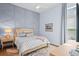 Spacious bedroom with light walls and a comfy bed at 9044 Luna Ln, Sarasota, FL 34241