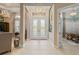 Bright and spacious entryway with double doors and high ceilings at 9044 Luna Ln, Sarasota, FL 34241