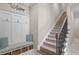 Inviting entryway with built-in bench and storage at 9044 Luna Ln, Sarasota, FL 34241