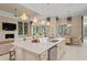 Gourmet kitchen featuring an expansive island and stainless steel appliances at 9044 Luna Ln, Sarasota, FL 34241