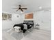 Bright bedroom with ceiling fan and en-suite bathroom at 1898 New Hampshire Ne Ave, St Petersburg, FL 33703